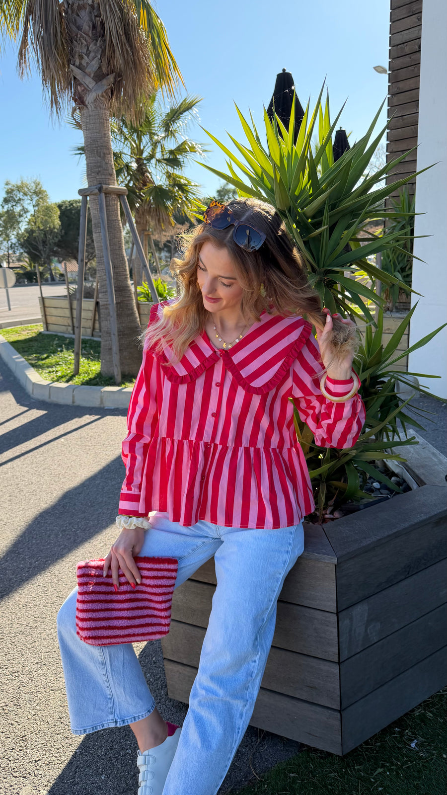 Blusa rosa brillante a rayas