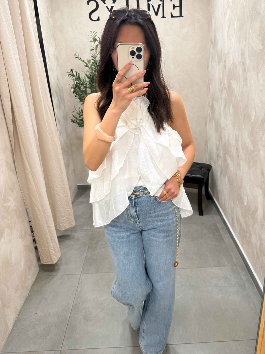 Top a volant blanc avec fleurs
