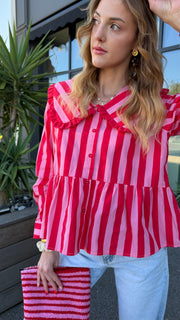 Blusa rosa brillante a rayas