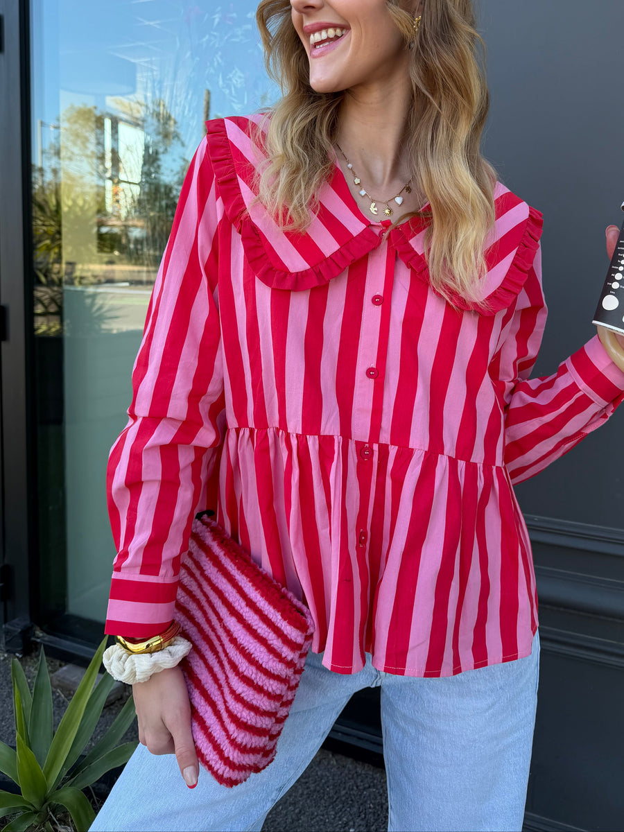 Blusa rosa brillante a rayas