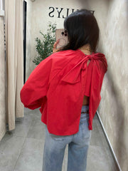 Blouse rouge dos nu