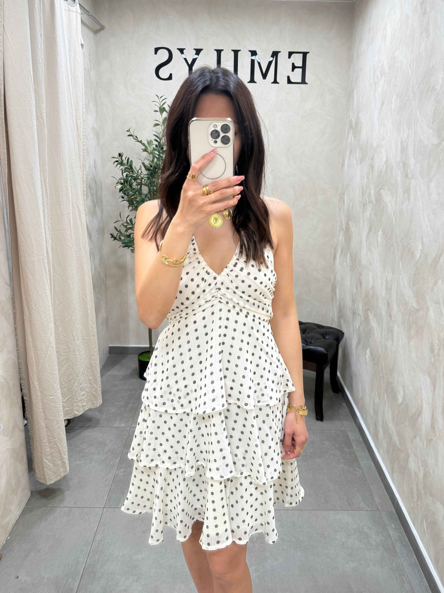 Robe à volant blanche à petits pois noirs